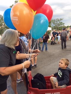 Stoneboro Fair Bank Night Balloons to child